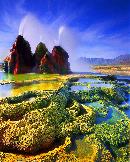 "It was late in the day.  As it cooled down the wind really picked up and the spray of water swayed 